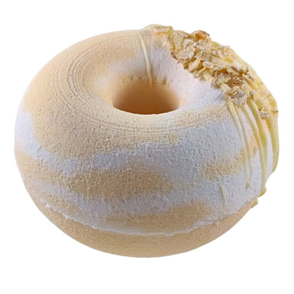 Experience the ultimate relaxation with our honey oatmeal donut fizzy bath bomb. Enjoy its calming effects and radiant skin!